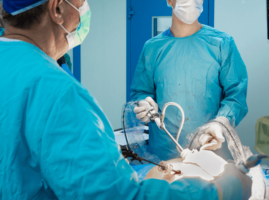 Surgical team performing a minimally invasive spine procedure